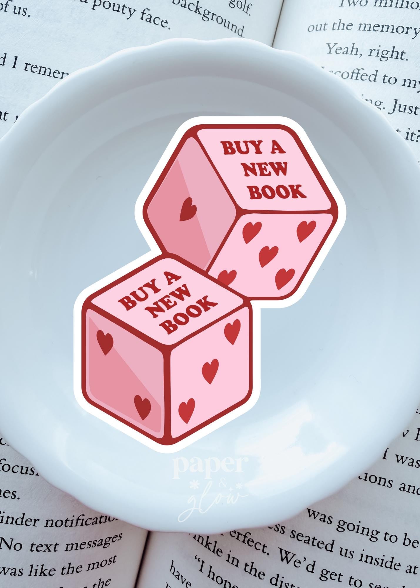 Buy a New Book Dice Sticker Vinyl Sticker | Paper and Glow